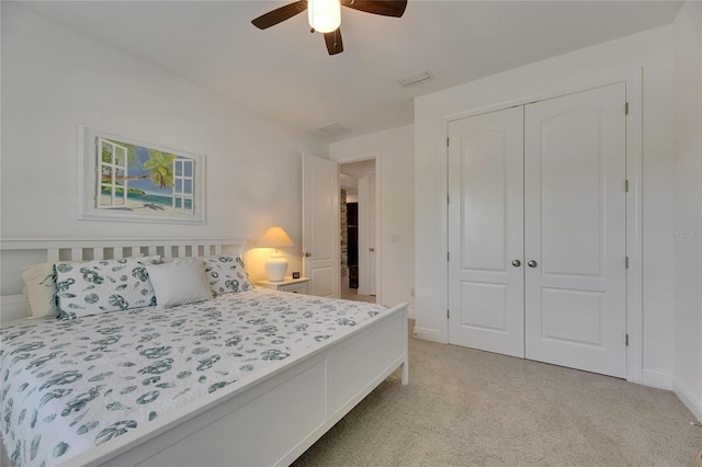 5814 Silver Sun Dr, Apollo Beach, FL 33572 - bedroom featuring light colored carpet, baseboards, a closet, and a ceiling fan