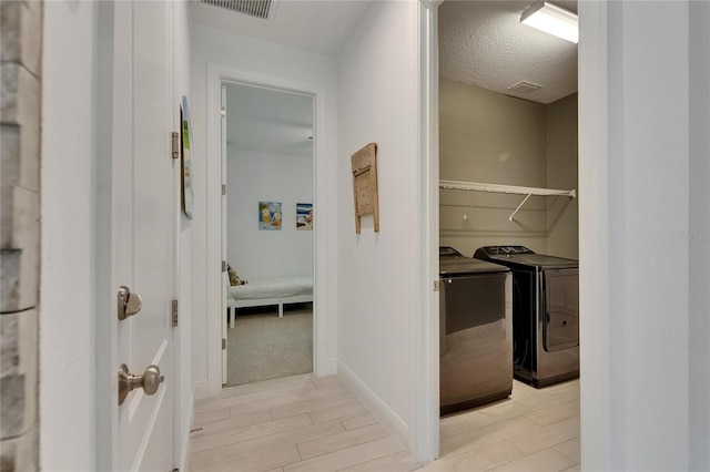 5814 Silver Sun Dr, Apollo Beach, FL 33572 - corridor featuring independent washer and dryer and baseboards