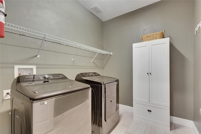 5814 Silver Sun Dr, Apollo Beach, FL 33572 - washroom with washer and clothes dryer and baseboards