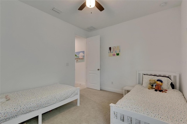 5814 Silver Sun Dr, Apollo Beach, FL 33572 - bedroom with light carpet, baseboards, and a ceiling fan