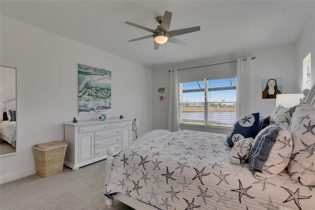 5814 Silver Sun Dr, Apollo Beach, FL 33572 - bedroom with carpet flooring, a ceiling fan, and baseboards