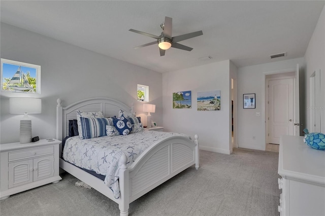 5814 Silver Sun Dr, Apollo Beach, FL 33572 - bedroom with light colored carpet, ceiling fan, and baseboards