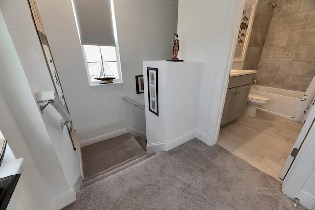 5814 Silver Sun Dr, Apollo Beach, FL 33572 - bathroom featuring vanity, shower / tub combination, baseboards, and toilet