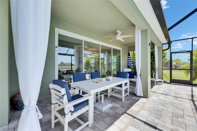 5814 Silver Sun Dr, Apollo Beach, FL 33572 - sunroom with a ceiling fan, outdoor dining area, and healthy amount of natural light