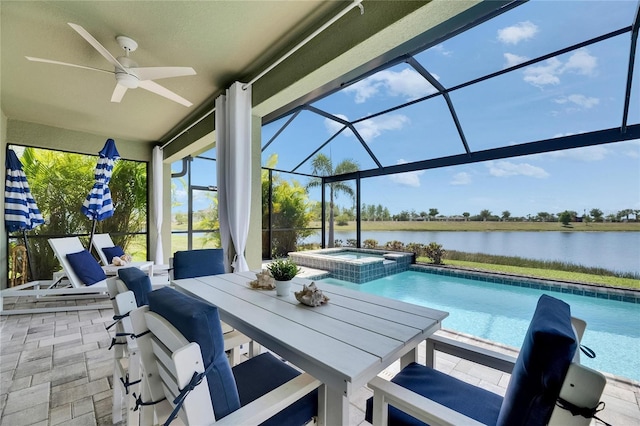 5814 Silver Sun Dr, Apollo Beach, FL 33572 - view of patio / terrace featuring a water view, ceiling fan, a lanai, a pool with connected hot tub, and outdoor dining area