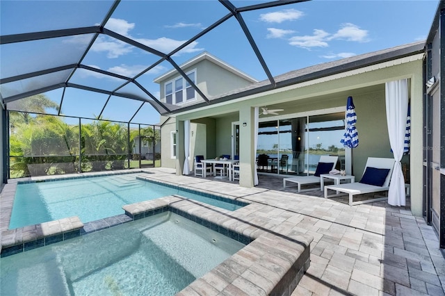 5814 Silver Sun Dr, Apollo Beach, FL 33572 - view of pool with a patio area, a pool with connected hot tub, a ceiling fan, outdoor dining space, and glass enclosure