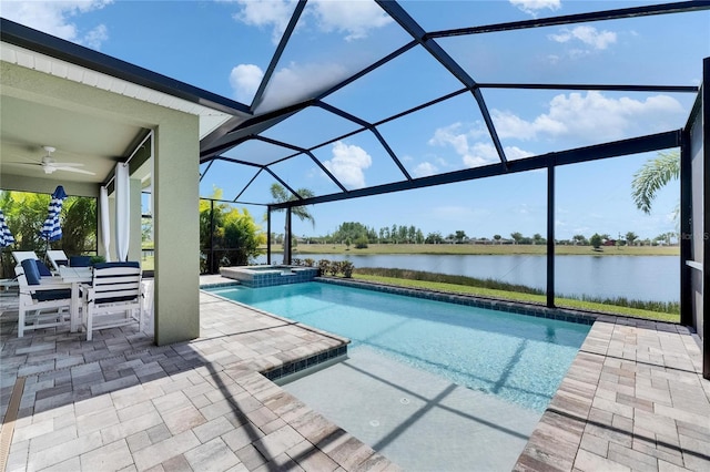 5814 Silver Sun Dr, Apollo Beach, FL 33572 - view of pool with a patio, a water view, a ceiling fan, and a pool with connected hot tub