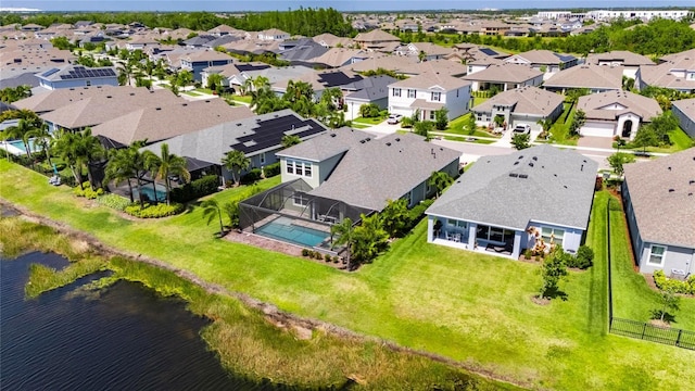 5814 Silver Sun Dr, Apollo Beach, FL 33572 - aerial perspective of suburban area with a large body of water and a pool area