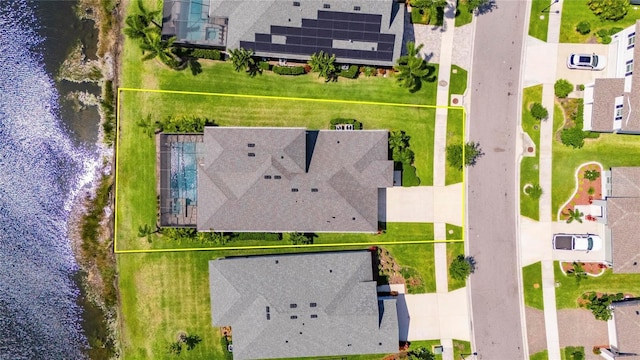 5814 Silver Sun Dr, Apollo Beach, FL 33572 - aerial perspective of suburban area with property boundaries highlighted and a large body of water
