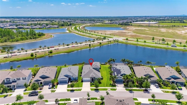 5814 Silver Sun Dr, Apollo Beach, FL 33572 - aerial perspective of suburban area featuring a nearby body of water