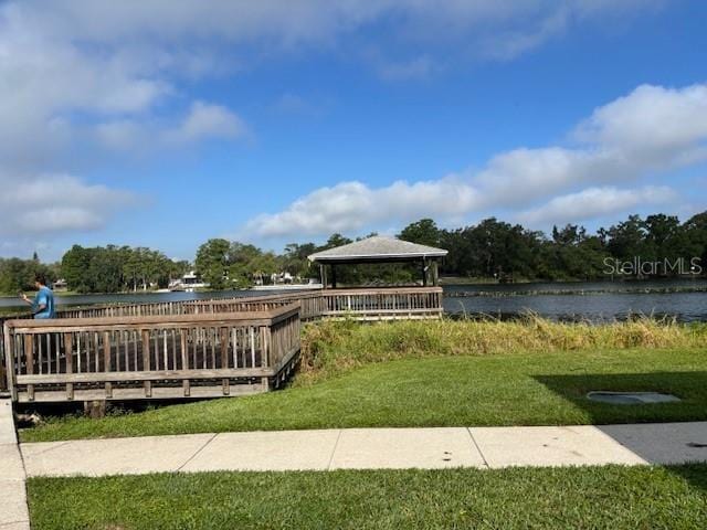 4127 Dolphin Dr Unit 4127, Tampa, FL 33617 - view of property's community featuring a yard, a water view, and a gazebo
