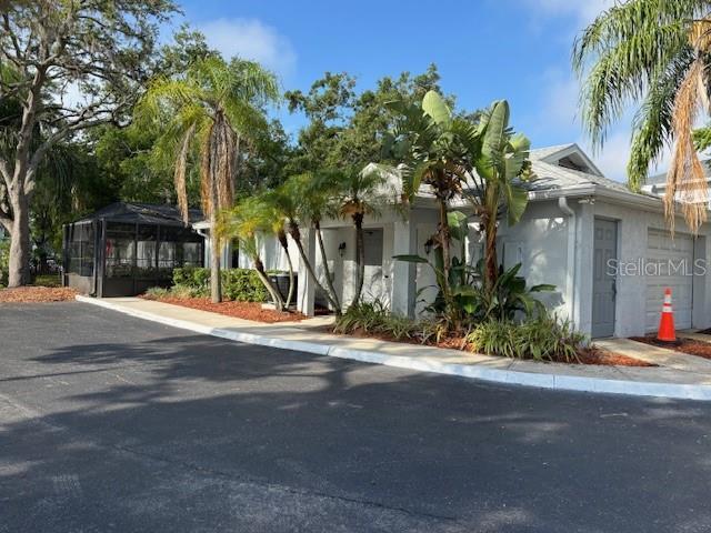 4127 Dolphin Dr Unit 4127, Tampa, FL 33617 - view of front of house with stucco siding
