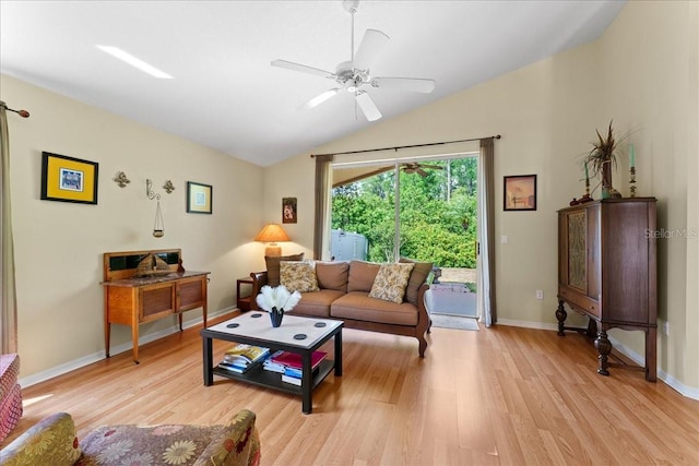 7235 Sharpsburg Blvd, New Port Richey, FL 34653 - living room featuring light wood-style floors, a ceiling fan, baseboards, and lofted ceiling