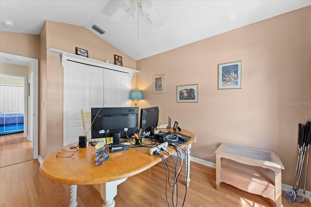 7235 Sharpsburg Blvd, New Port Richey, FL 34653 - office featuring ceiling fan, visible vents, vaulted ceiling, wood finished floors, and baseboards