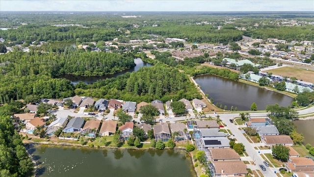 7235 Sharpsburg Blvd, New Port Richey, FL 34653 - bird's eye view with a water view, a view of trees, and a residential view