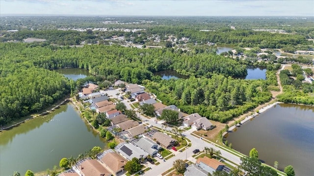7235 Sharpsburg Blvd, New Port Richey, FL 34653 - bird's eye view with a water view, a view of trees, and a residential view