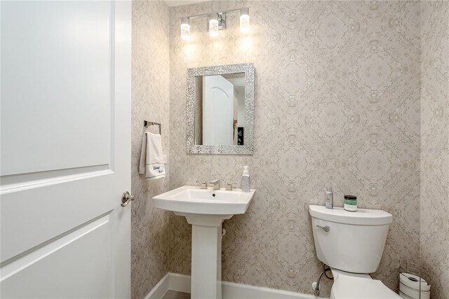 bathroom featuring toilet