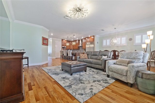 1432 Gopher Loop, Tarpon Springs, FL 34689 - living room with visible vents, a chandelier, light wood-style floors, ornamental molding, and recessed lighting