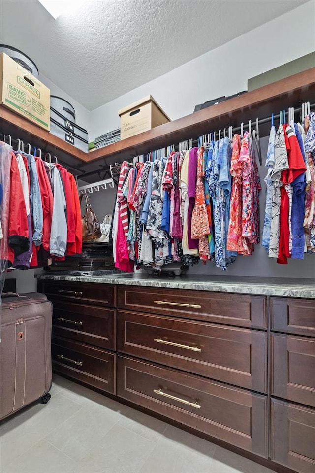 1432 Gopher Loop, Tarpon Springs, FL 34689 - spacious closet featuring light tile patterned flooring