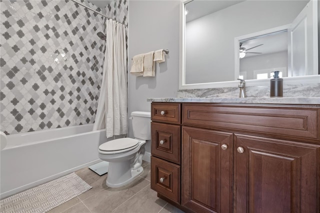 1432 Gopher Loop, Tarpon Springs, FL 34689 - full bath with vanity, shower / bath combo with shower curtain, toilet, ceiling fan, and tile patterned floors