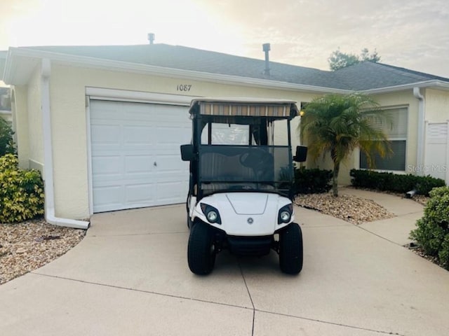 garage with driveway
