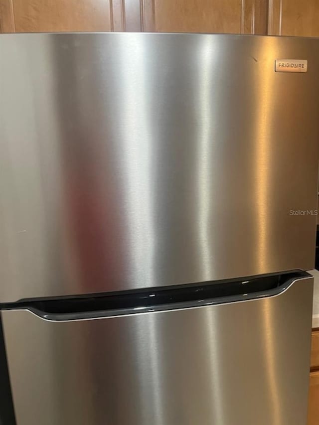interior details with freestanding refrigerator