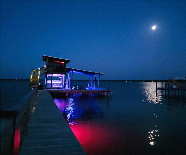view of dock with a water view