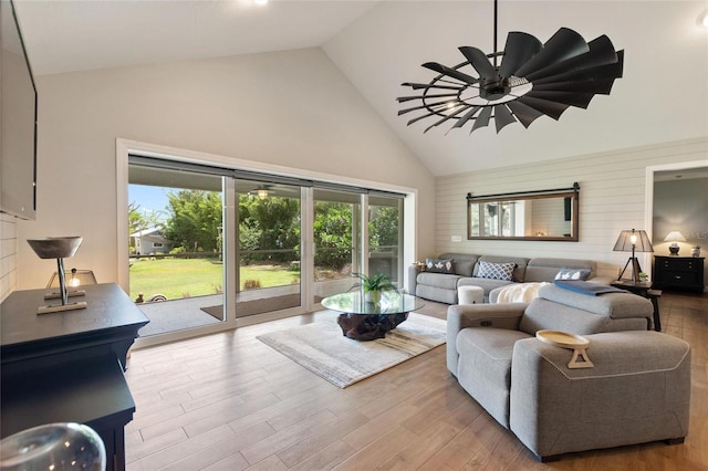1395 S Lake Reedy Blvd, Frostproof, FL 33843 - living room featuring high vaulted ceiling, plenty of natural light, wood finished floors, and ceiling fan