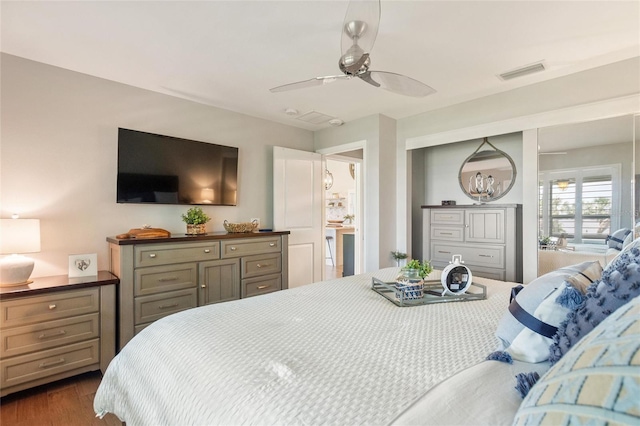 1395 S Lake Reedy Blvd, Frostproof, FL 33843 - bedroom featuring dark wood-style floors, ceiling fan, and a closet