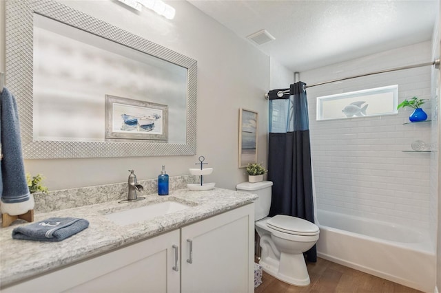 1395 S Lake Reedy Blvd, Frostproof, FL 33843 - bathroom with toilet, wood finished floors, vanity, and shower / bath combination with curtain