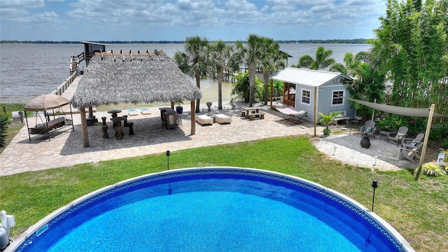 1395 S Lake Reedy Blvd, Frostproof, FL 33843 - view of pool featuring an outbuilding, a lawn, a gazebo, a patio area, and an exterior structure