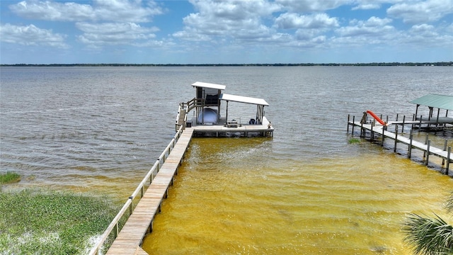1395 S Lake Reedy Blvd, Frostproof, FL 33843 - dock area featuring a water view and boat lift