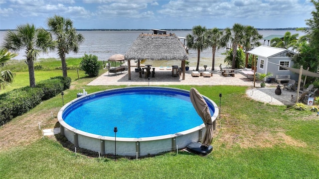 1395 S Lake Reedy Blvd, Frostproof, FL 33843 - swimming pool with a gazebo, a yard, a water view, and a patio