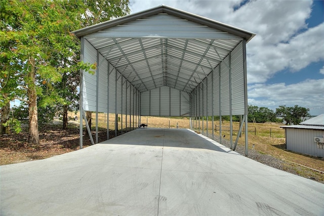 1395 S Lake Reedy Blvd, Frostproof, FL 33843 - view of vehicle parking with concrete driveway and a carport
