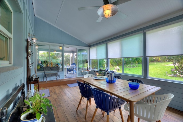 1395 S Lake Reedy Blvd, Frostproof, FL 33843 - sunroom / solarium featuring lofted ceiling, plenty of natural light, ceiling fan, and outdoor dining space