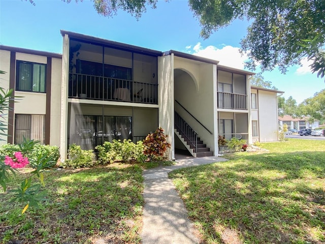 2643 Pine Ridge Way S Unit A1, Palm Harbor, FL 34684 - view of property with stairs