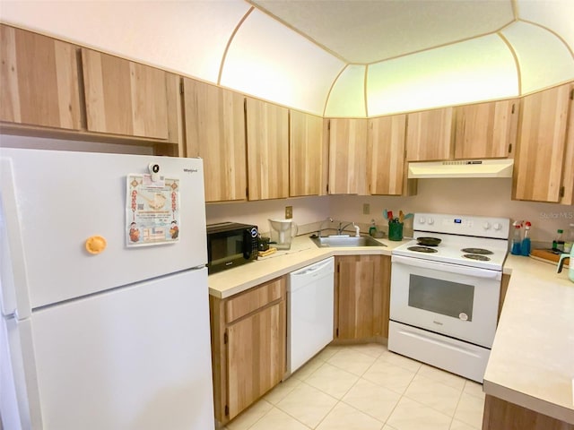 2643 Pine Ridge Way S Unit A1, Palm Harbor, FL 34684 - kitchen featuring a sink, under cabinet range hood, white appliances, light brown cabinetry, and light countertops