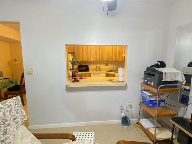 2643 Pine Ridge Way S Unit A1, Palm Harbor, FL 34684 - interior space featuring ceiling fan, baseboards, and a sink