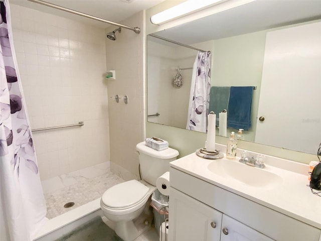 2643 Pine Ridge Way S Unit A1, Palm Harbor, FL 34684 - bathroom featuring toilet, a tile shower, and vanity