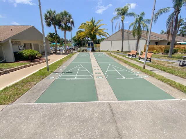 2643 Pine Ridge Way S Unit A1, Palm Harbor, FL 34684 - view of home's community featuring fence and shuffleboard