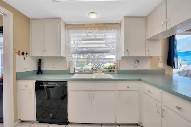 kitchen featuring decorative backsplash, light countertops, white cabinets, a sink, and dishwasher