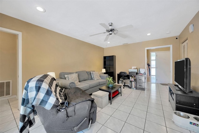 living room featuring light tile patterned flooring, a ceiling fan, visible vents, and recessed lighting