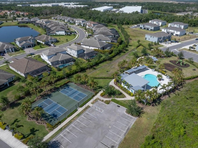aerial view featuring a water view and a residential view