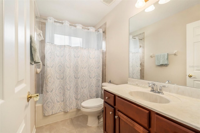 full bathroom with visible vents, vanity, toilet, shower / bathtub combination with curtain, and tile patterned floors