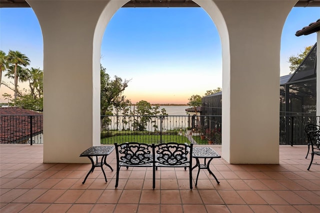 view of patio / terrace featuring a water view