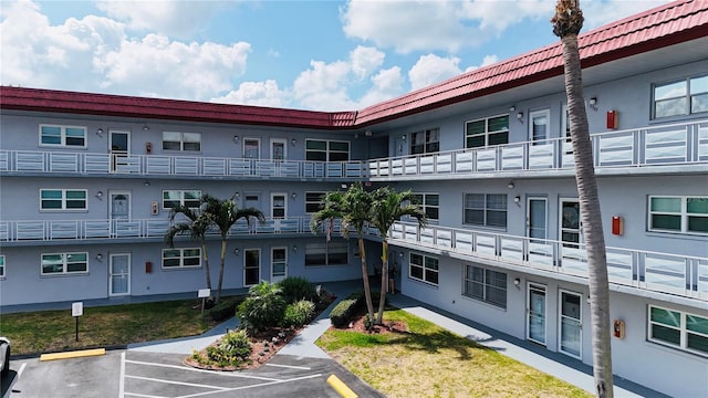 5660 80th St N Unit C101, Saint Petersburg, FL 33709 - view of property with uncovered parking