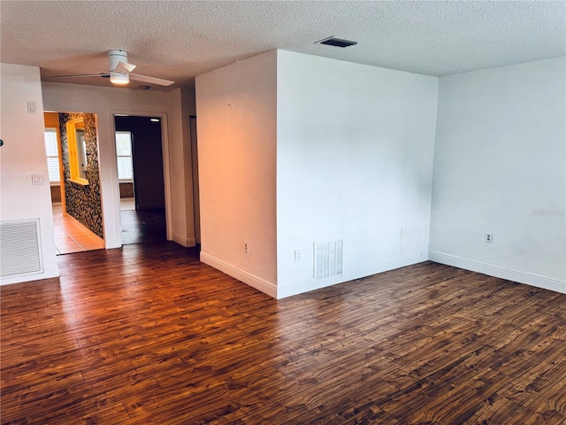 5660 80th St N Unit C101, Saint Petersburg, FL 33709 - unfurnished room featuring a textured ceiling, visible vents, and wood finished floors