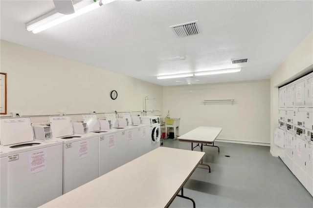 5660 80th St N Unit C101, Saint Petersburg, FL 33709 - shared laundry area featuring ceiling fan, washing machine and dryer, and visible vents