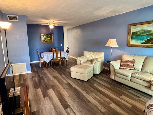 2020 World Parkway Blvd Unit 14, Clearwater, FL 33763 - living room featuring wood finished floors, visible vents, a ceiling fan, and baseboards