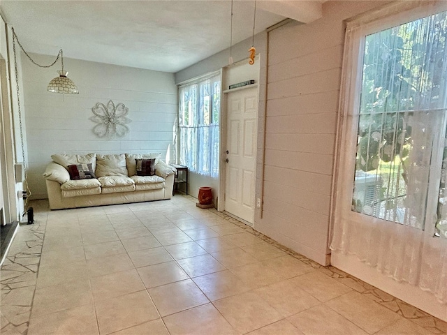 2020 World Parkway Blvd Unit 14, Clearwater, FL 33763 - living room with light tile patterned floors